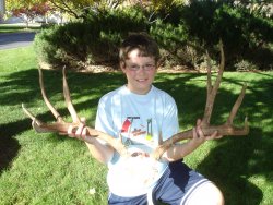 Dallen showing off the the 30 inch rack of the buck he spotted with me