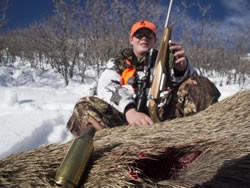 Dallen with A-Bolt Stainless Laminate 243 WSSM and his 2010 Cow Elk